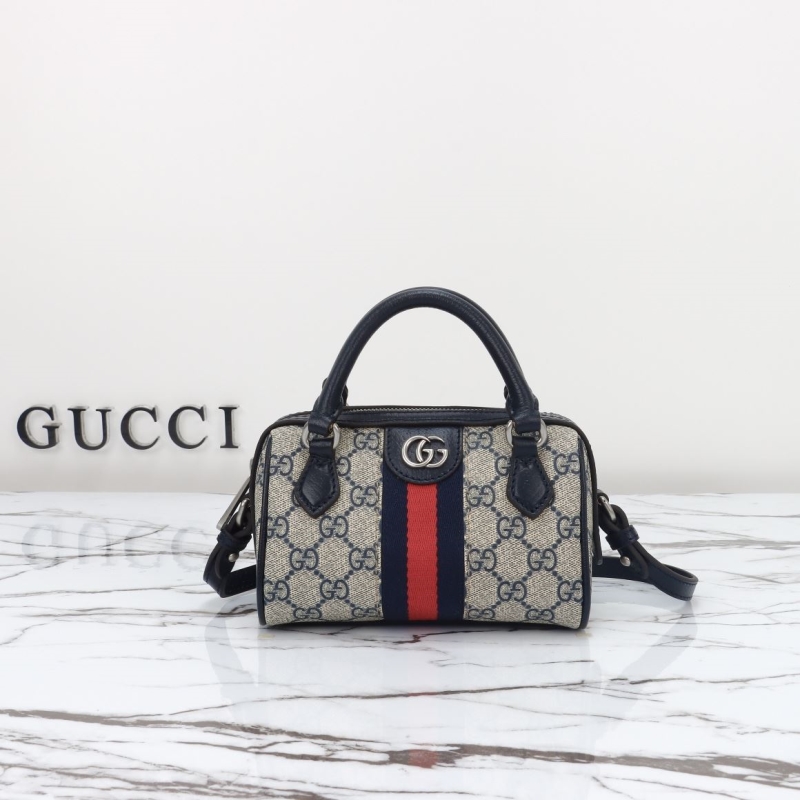G*u*i top handle bags
